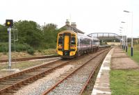A 158 leaves Georgemas Junction for Inverness on 28 August. The Thurso line comes in from the left.<br><br>[John Furnevel 28/08/2007]