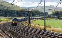 Northbound Tesco containers at Abington.<br><br>[Ewan Crawford 25/09/2007]