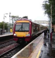 Glasgow bound service arriving at Bishopbriggs on 18 August.<br><br>[David Panton 18/8/2007]