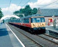 303 106 with a Glasgow train at Bishopton in June 1998.<br><br>[David Panton /6/1998]