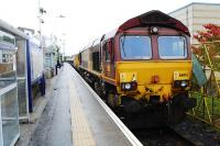 The freight train now standing at platform 1 is for ... track re-doubling.<br><br>[Ewan Crawford 16/09/2007]