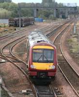 Looking west over Cadder Yard on 27 September as a train for Glasgow Queen Street passes through.<br><br>[John Furnevel 27/9/2007]