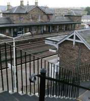 Stairs from the South Bridge to the up platform at Cupar show the original station on the down line.<br><br>[Brian Forbes 09/10/2007]