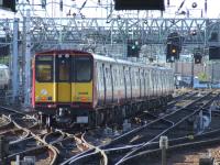 314216 departs from Glasgow Central on an empty coaching stock movement<br><br>[Graham Morgan 10/09/2007]