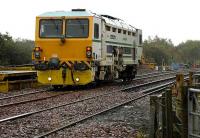 A track machine standing on the new second line through Uphall station on 9 October 2007. View east towards Edinburgh.<br><br>[Bill Roberton 9/10/2007]