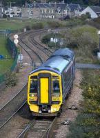 158731 approaches Lammerlaws Bridge in Burntisland on 12 October with the disused connection to the former harbour branch in the foreground. <br><br>[Bill Roberton 12/10/2007]