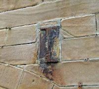 Remains of a roof beam support buried in the wall at Greenock Central. The station had a glazed roof at one time, but it was allowed to deteriorate before finally being demolished by Railtrack as part of the so called refurbishment of the station.<br><br>[Graham Morgan 11/09/2007]