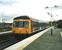 Experimental Scotrail livery applied to 101692 seen at Barrhead on a service to Glasgow Central in July 1998.<br><br>[David Panton /07/1998]