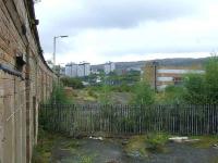 Looking east over the site of the former goods yard at Greenock Central. The yard ran as far as the camera position. Now empty, its most recent use was as a BT depot.<br><br>[Graham Morgan 11/09/2007]