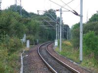 Just west of Whinhill lay the junction where the Overton branch once left the main Wemyss Bay line (just beyond the bridge). From here it ran to Overton paper mill.<br><br>[Graham Morgan 11/09/2007]