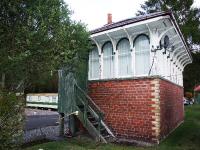 Caledonian Railway signal box at St Fillans. The steps and entrance porch look like the originals. It appears to be in use as accommodation and has acquired a satellite receiver.<br><br>[John Gray 18/10/2007]