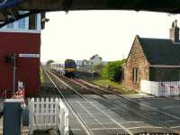 Aberdeen express class 170 passing the former Carnoustie station (closed 1900) The camera is on the present up platform.<br><br>[Brian Forbes 19/10/2007]