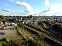 A general view of Inverness. On the right are the far north platforms with 158 778 heading a four car train. In the foreground is the rusted track of the former harbour branch which now ends in two sidings. On the left stands the carriage shed. Centre left is the re-roofed Lochgorm Works and in the right background the main station building.<br><br>[John Gray 20/10/2007]