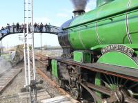 246 Morayshire starts a trip to Birkhill, with enthusiasts on the footbridge.<br><br>[Brian Forbes /04/2007]