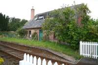 Approximately 5 miles northeast of Dingwall on the north shore of the Cromarty Firth stand the remains of the long closed station at Foulis, seen from the south side of the private crossing in August 2007. <br><br>[John Furnevel 30/08/2007]