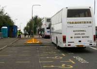 <I>The next train to Bathgate will be... a bus.</I> Scene in the car park at Livingston North station on Sunday 21 October 2007 during occupation of the line for widening work.<br><br>[John Furnevel 21/10/2007]