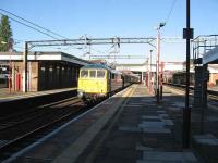 Having run light from Doncaster to Crewe the previous day, 86101 heads south through Harrow & Wealdstone on 20 October with the Crewe to Euston leg of the <I>Atomic Harbour Master</I> railtour to Dungeness. <br><br>[Michael Gibb 20/10/2007]