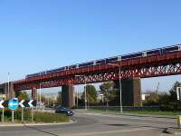 Five car DMU heading north over Jamestown Viaduct. The town of Inverkeithing is seen through the piers.<br><br>[Brian Forbes 23/10/2007]