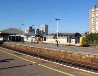 37601 and 37603 head the Euston-Folkestone leg of the <I>Atomic Harbour Master</I> through Clapham Junction on 20 October.<br><br>[Michael Gibb 20/10/2007]