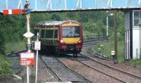 SPTE 170471 coming through the road at Dunblane. The signal box on the right was originally called Dunblane North.<br><br>[Brian Forbes /09/2007]