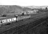 Class 47 1620 heads an ECML train south out of Aberdeen past Ferryhill Junction on 21 April 1973 with the Dee Viaduct in the right background. Seen from the area behind Ferryhill SB.<br><br>[John McIntyre 21/04/1973]