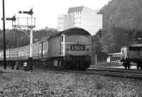 The Euston - Inverness sleeper heads north from Aviemore on a June morning in 1974. Immediately behind the class 47 at the head of the train is a measurement coach with distinctly LMS origins.<br><br>[John McIntyre 16/06/1974]