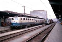 A class 141 stands at Wurzburg with a PP set in June 1990 while a shunter waits on the centre road.<br><br>[John McIntyre /06/1990]