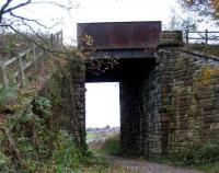 Looking southwest through the bridge standing on the west to south alignment at Whitehouse on 8 November. In the background a class 185 can be seen heading for Preston on the WCML.<br><br>[John McIntyre 08/11/2007]