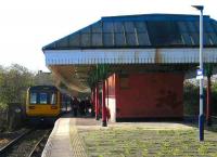 Looking west along the platform at Nelson on 8 November with a Colne - Blackpool North service having just arrived.<br><br>[John McIntyre 08/11/2007]