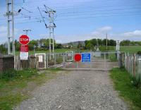 Geilston level crossing just west of Cardross on 29 April. The crossing - keepers cottage once stood on the right but has now been demolished.<br><br>[John McIntyre 29/04/2007]