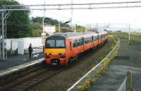 View east at Craigendoran in July 1997 with 320 322 en route to Helensburgh Central.<br><br>[David Panton /07/1997]