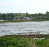 Looking across to the north shore of the Clyde on 29 April as a Helensburgh train pulls into Cardross.<br><br>[John McIntyre 29/04/2007]