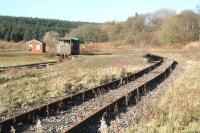 View over Riccarton Junction from the southeast on 7 November 2007 with rails having been relaid by the <I>Friends of Riccarton Junction</I> along the route of the up Waverley line running through the picture. The old brake van is standing in the remains of the bay platform once used by trains on the Border Counties Railway from Hexham.<br><br>[John Furnevel 07/11/2007]