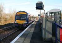 Waverley - Bathgate service arriving at Uphall on 15 November 2007, with the second track now laid through the station.<br><br>[John Furnevel 15/11/2007]