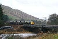 Freightliner 66583 northbound over the River Clyde at Lamington on 26 November.<br><br>[John Furnevel 26/11/2007]