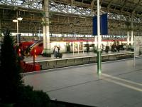 A Virgin Manchester - London Euston service at Manchester Piccadilly.<br><br>[Alistair MacKenzie 03/12/2007]