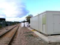 Looking west towards Stirling past the recently completed signal cabinet from the level crossing at Cambus on 11 November.<br><br>[Brian Forbes 11/11/2007]