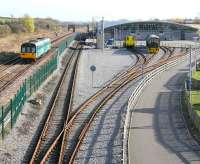 View southeast from Spout Lane road bridge on 4 November 2007 showing the main <I>Locomotion</I> exhibition hall and sidings at NRM Shildon, as a class 142 runs past to the left on a Saltburn - Bishop Auckland service.<br><br>[John Furnevel 04/11/2007]