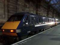 91101 stands at Platform 1 of Glasgow Central with National Express East Coast branding displayed one day ahead of the NXEC launch on 9th December.<br><br>[Graham Morgan 08/12/2007]