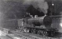 LMS 14521 at St Enoch in 1935. A P Drummond Class 137 built for the Glasgow & South Western as No 152 (later 330/19). The engine was built in 1915 and withdrawn in 1937 as non standard by the LMS.<br><br>[Graham Morgan Collection //1935]