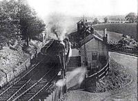 D34 class 62496 Glen Loy restarts a Kinross train at Rumbling Bridge with a wave from signalman Len Morton on the last day of service. 14.06.1964 <br><br>[Garry Morton 14/06/1964]