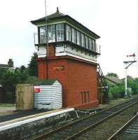 Looking towards Aberdeen from the south end of Dyce station in July 1998. The former Buchan line was served by a platform off to the left with the junction just beyond the signal box.<br><br>[David Panton /07/1998]