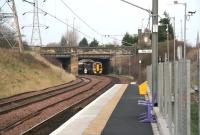 Following recent completion of the work at Waverley, what had become the Waverley - Newcraighall shuttle has now reverted to its former role in providing Edinburgh 'crossrail' services. Here the 11.25 Bathgate - Newcraighall 158 rounds the curve south after leaving the ECML at Portobello Junction on 14 December and runs under Milton Road on the approach to Brunstane station.     <br><br>[John Furnevel 14/12/2007]