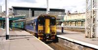 A class 153 single car unit, on the rear of a 156 service from Preston via the Cumbrian coast, stands in the M&C bay at Carlisle on 19 September 2006.<br><br>[John McIntyre 19/09/2006]