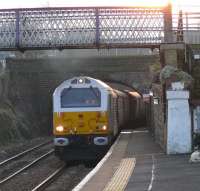 The Northern Belle accelerates through Kinghorn station with leading loco 67029 blasting exhaust.<br><br>[Brian Forbes 14/12/2007]