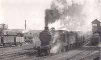 Pickersgill Caledonian Class 72 54496 at Keith, possibly passing through the goods yard. Photo is undated, but likely to be some time in the 1950s.<br><br>[Graham Morgan Collection //]