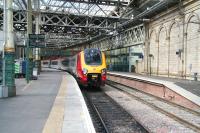 A Virgin Voyager service to Birmingham New Street stands at Waverley platform 2 on 6 September 2007, alongside the newly commissioned platform 1.<br><br>[John Furnevel 06/09/2007]