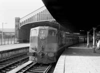 CIE 165 shortly after arrival with a train at Kent station, Cork, in 1988.<br><br>[Bill Roberton //1988]