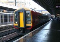 SWT liveried 158789 calls at Haymarket on 20 December with a Bathgate service. <br><br>[John Furnevel 20/12/2007]