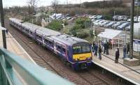 A North Berwick - Edinburgh Waverley 322 service pulls away from Wallyford on 16 December.<br><br>[John Furnevel /12/2007]